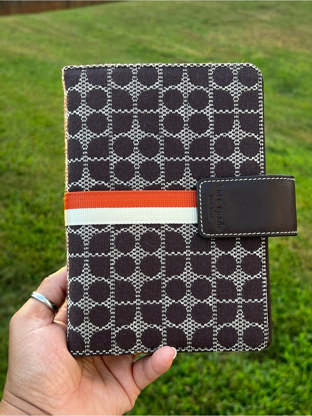 kate spade brown tablet folio with orange and cream stripe